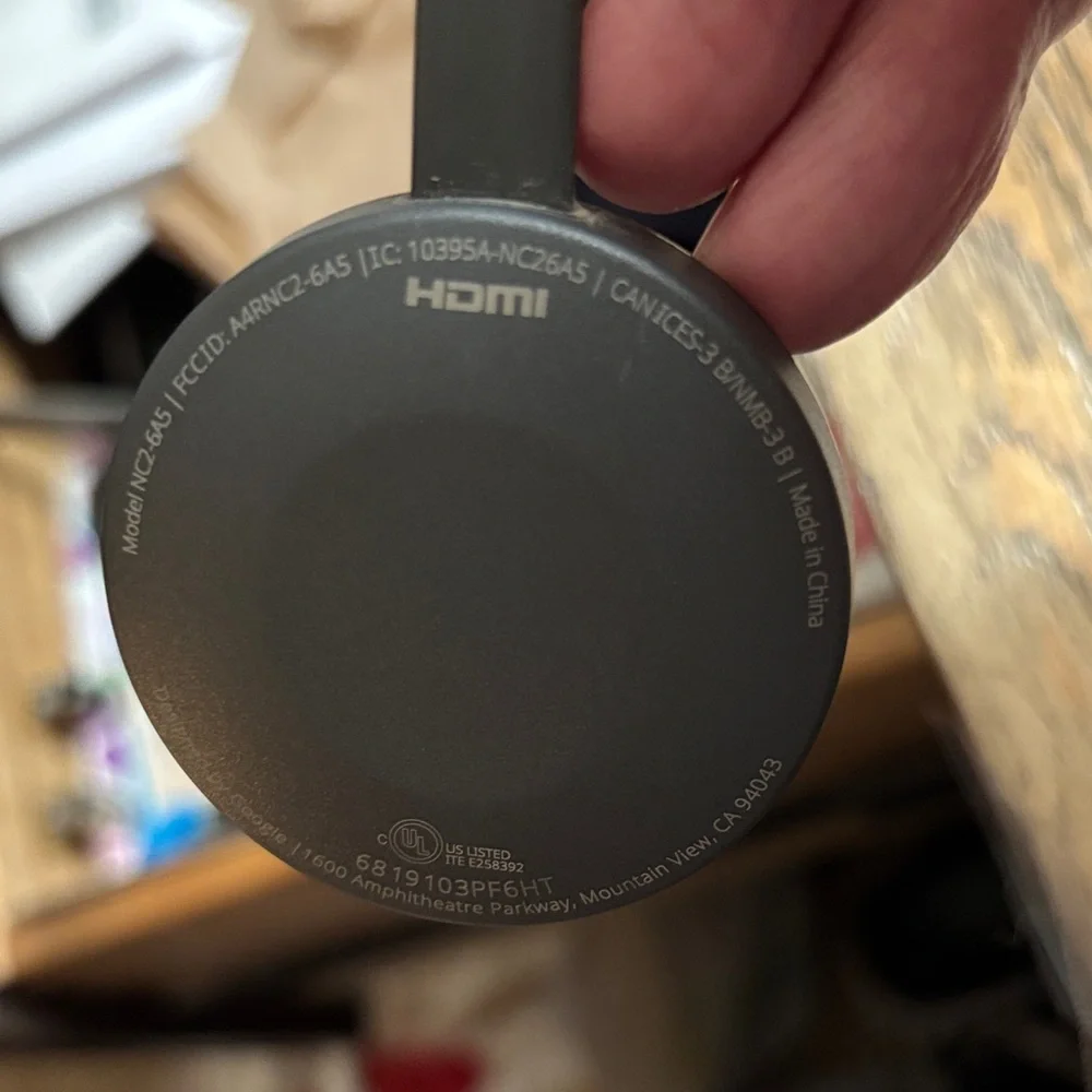 google Chromecast HDMI Streaming Dongle in Black with Power Adapter